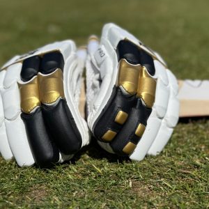 Kraze pro black gold resting on a bat