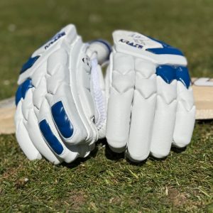 A pair of kraze gloves resting on a bat